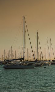 Preview wallpaper boats, sea, masts, evening