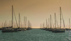 Preview wallpaper boats, sea, masts, evening