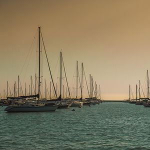 Preview wallpaper boats, sea, masts, evening