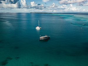 Preview wallpaper boats, sea, water, clouds, sky, aerial view