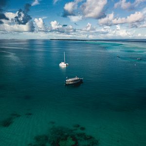 Preview wallpaper boats, sea, water, clouds, sky, aerial view