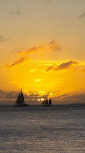 Preview wallpaper boats, ships, sails, silhouettes, sea, sunset