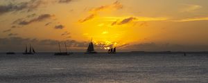 Preview wallpaper boats, ships, sails, silhouettes, sea, sunset