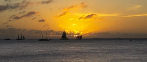 Preview wallpaper boats, ships, sails, silhouettes, sea, sunset