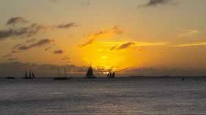 Preview wallpaper boats, ships, sails, silhouettes, sea, sunset