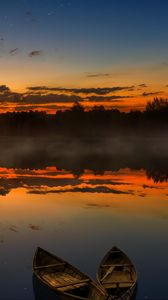 Preview wallpaper boats, sunset, lake, horizon, clouds