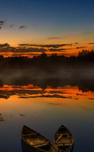 Preview wallpaper boats, sunset, lake, horizon, clouds