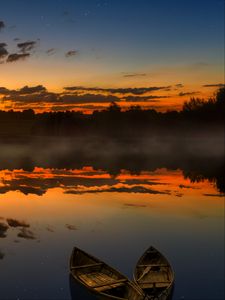 Preview wallpaper boats, sunset, lake, horizon, clouds