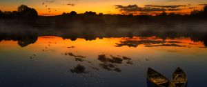 Preview wallpaper boats, sunset, lake, horizon, clouds