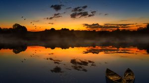 Preview wallpaper boats, sunset, lake, horizon, clouds