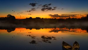 Preview wallpaper boats, sunset, lake, horizon, clouds