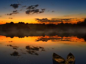 Preview wallpaper boats, sunset, lake, horizon, clouds