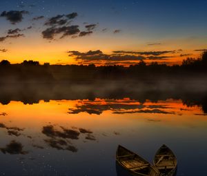 Preview wallpaper boats, sunset, lake, horizon, clouds