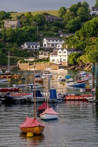 Preview wallpaper boats, water, buildings, hill