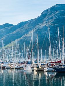 Preview wallpaper boats, yachts, masts, sea, mountains