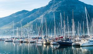 Preview wallpaper boats, yachts, masts, sea, mountains