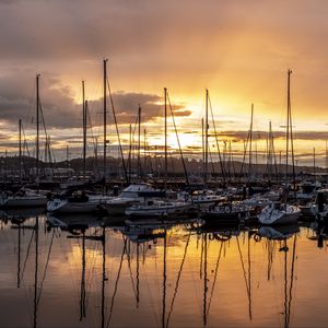 Preview wallpaper boats, yachts, sunset, bay, dark