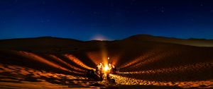 Preview wallpaper bonfire, camping, desert, people, night, starry sky, morocco