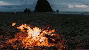 Preview wallpaper bonfire, fire, beach, sand, dusk