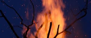 Preview wallpaper bonfire, fire, branches, sparks