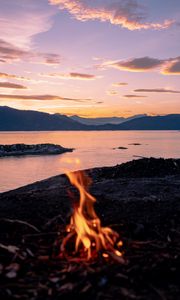 Preview wallpaper bonfire, fire, camping, sea, mountains, sunset