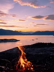 Preview wallpaper bonfire, fire, camping, sea, mountains, sunset