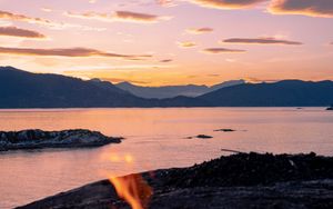 Preview wallpaper bonfire, fire, camping, sea, mountains, sunset