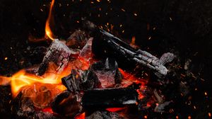 Preview wallpaper bonfire, fire, embers, sparks