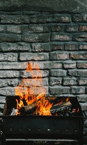 Preview wallpaper bonfire, fire, firewood, wall