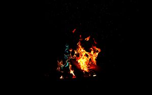 Preview wallpaper bonfire, fire, firewood, sparks, dark, light, camping