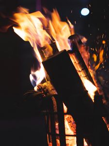 Preview wallpaper bonfire, fire, firewood, sparks, coal