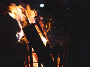 Preview wallpaper bonfire, fire, firewood, sparks, coal