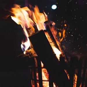 Preview wallpaper bonfire, fire, firewood, sparks, coal