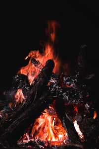 Preview wallpaper bonfire, fire, firewood, embers, dark