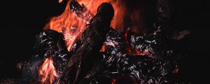 Preview wallpaper bonfire, fire, firewood, embers, dark