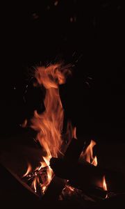 Preview wallpaper bonfire, fire, flame, sparks, dark, burning