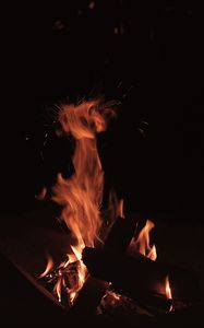 Preview wallpaper bonfire, fire, flame, sparks, dark, burning