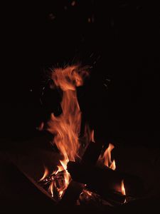 Preview wallpaper bonfire, fire, flame, sparks, dark, burning