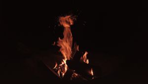 Preview wallpaper bonfire, fire, flame, sparks, dark, burning