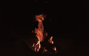 Preview wallpaper bonfire, fire, flame, sparks, dark, burning