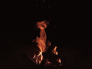 Preview wallpaper bonfire, fire, flame, sparks, dark, burning