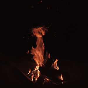 Preview wallpaper bonfire, fire, flame, sparks, dark, burning