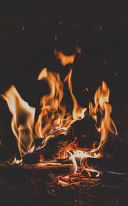 Preview wallpaper bonfire, fire, flame, firewood, ash, coal, camping, dark