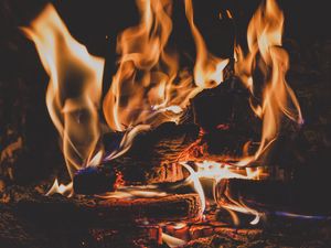 Preview wallpaper bonfire, fire, flame, firewood, ash, coal, camping, dark