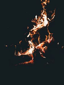 Preview wallpaper bonfire, fire, flame, firewood, dark, camping, burning