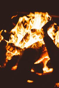 Preview wallpaper bonfire, fire, flame, firewood, dark, blur