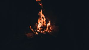 Preview wallpaper bonfire, fire, flame, firewood, night, darkness, dark
