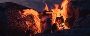 Preview wallpaper bonfire, fire, flame, stones, firewood