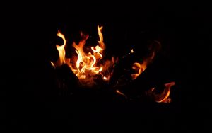 Preview wallpaper bonfire, fire, flame, sparks, dark