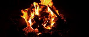 Preview wallpaper bonfire, fire, flame, black